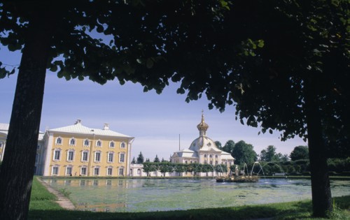 RUSSIA,  , St Petersburg, Puskin palace viewed from under tree branches