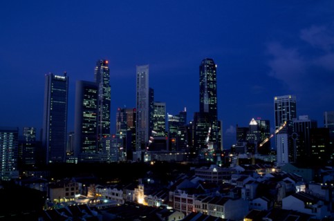 SINGAPORE, Raffles Place, City skyline illuminated at night