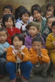 CHINA, Guizhou Province, Zhijin, Crowd of school children.