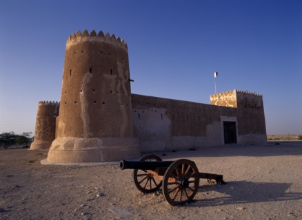 QATAR, Zubara, "Exterior view of a fort with crenellated towers, built in 1938 and used as a police