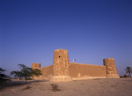 QATAR, Zubara, "Exterior view of a fort with crenellated towers, built in 1938 and used as a police