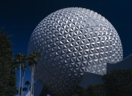 USA, Florida , Orlando , Walt Disney Epcot Centre. Spaceship Earth surrounded by Palm Trees