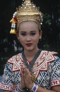 THAILAND, Bangkok, Erewan Shrine Temple Dancer giving a traditional Thai Wai greeting
