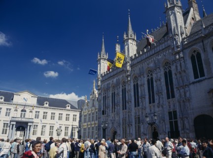 BELGIUM, West Flanders, Bruges, Burg Square with tourists outside the Stadhuis