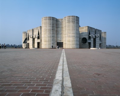 BANGLADESH, Dhaka, Modern stone parliament building with rounded towers.