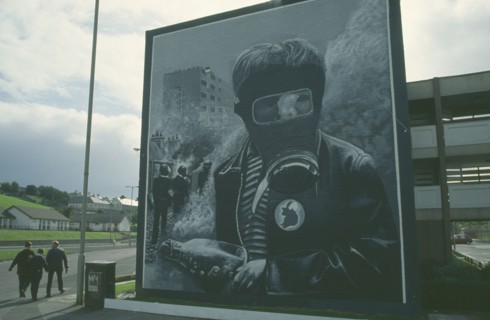 IRELAND,  North  , Derry, Nationalist mural depicting a boy wearing a Gas Mask on the Bogside.