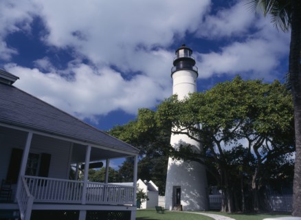 USA, Florida, Key West , Lighthouse Museum seen behind tree