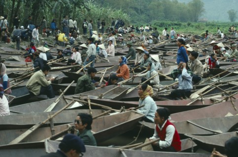 VIETNAM, Central, Hue, Small rowing boats waiting for tourist custom at the Perfume Pagoda.