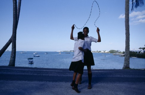 BERMUDA, Mangrove Bay, Schoolgirls playing with skipping rope.
