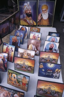 INDIA, Punjab, Amritsar, Souvenir pictures of Sikh gurus for sale.