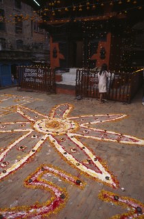 NEPAL,  , Kathmandu, Pattern made from coloured powder and marigold petals for Diwali festival