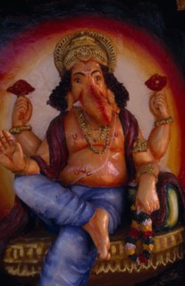 INDIA, Goa, Arambol, Painted temple statue of elephant headed god Ganesh.