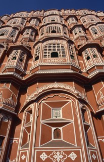 INDIA, Rajasthan, Jaipur, Hawa Mahal or Palace of the Winds. View looking up at the pink facade of