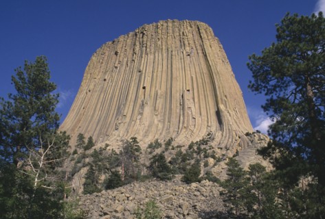 USA, Wyoming, Devils Tower, View looking upwards toward the volcanic outcrop peak of the National