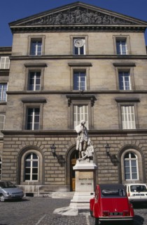 FRANCE, Il de France, Paris, Statue of Valentin Hauy outside the Institute for the Blind building.