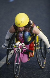 10037055 SPORT Athletics Marathon Disabled competitor in a racing wheelchair during the London Marathon.