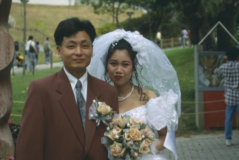 HONG KONG, Central, Hong Kong Park, "Fashionable western style wedding.  Bride and groom, head and