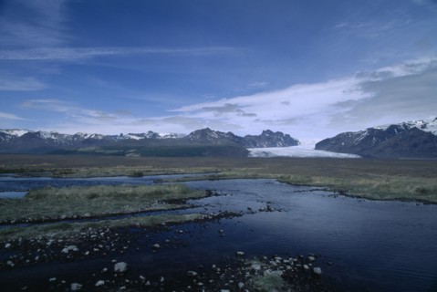 ICELAND,  , Vatnajokull Glacier, Landscape with edge of glacier in distance.