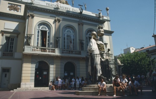 SPAIN, Figueres, Salvador Dali Theatre museum with surrealist sculpture standing outside.