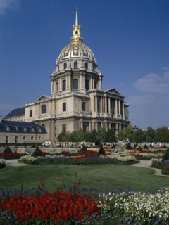 FRANCE, Ile de France  , Paris, "Hotel des Invalides, exterior with red, white and purple flowers
