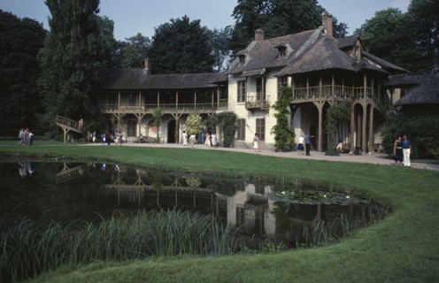 FRANCE, Ile de France, Paris, "Versailles.  The Queens Cottage in the Hamlet, exterior with tourist