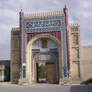 UZBEKISTAN,   , Bukhara, The Summer Palace. The entrance gate with vivid mosaics and wooden door