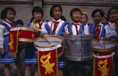 CHINA, Xining, Girls playing drums in school band