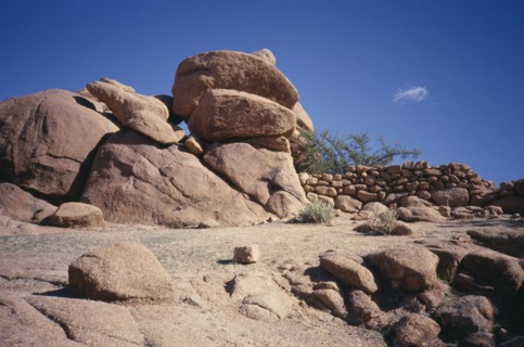MOROCCO, Anti Atlas, Atlas Mountains, Tafraout. Rocks and stone wall