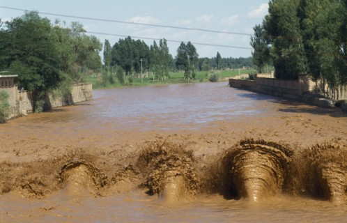 CHINA, Yinchuan, Yellow River, View up the muddy irrigation canal.