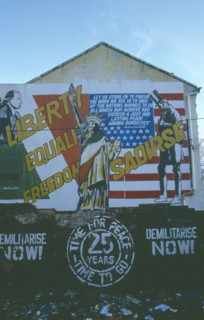 IRELAND, North, Belfast, Saoirse Mural on gable wall in Falls Road next to Dunville Park.