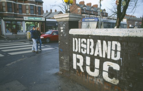 IRELAND, North, Belfast, "Disband RUC grafitti near Falls Road, Donegall Road area"