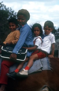 CUBA, People, Woman and three children sitting on horseback