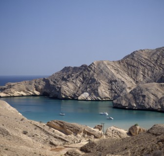 OMAN, Capital Area, Bander Jissah, "Gulf of Oman. View from coastline over bay with yachts and a