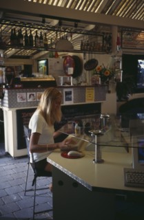 COMPUTERS , World Wide Web, Internet Cafe,  AUSTRALIA Byron Bay. Internet cafe with girl at