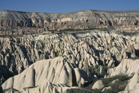 TURKEY, Cappadocia , Rose Valley, Valley with peaks and pinnacles of volcanic rock formations near