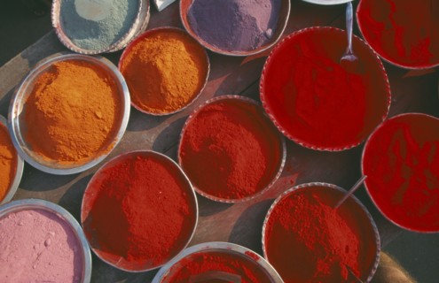 INDIA, Orissa, Puri, Dishes of colourful tika paint powder.