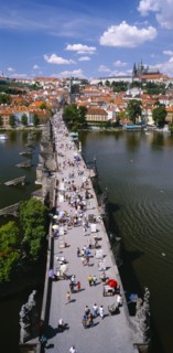 CZECH REPUBLIC, Stredocesky, Prague , Mala Strana.  Charles Bridge.  Aerial view along bridge busy