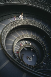 ITALY, Rome  , Vatican City, The spiral staircase in the Vatican Museum with tourists descending