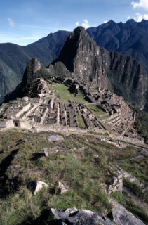 PERU, Cusco, Machu Picchu, General view over the Inca ruins set in rocky mountain landscape