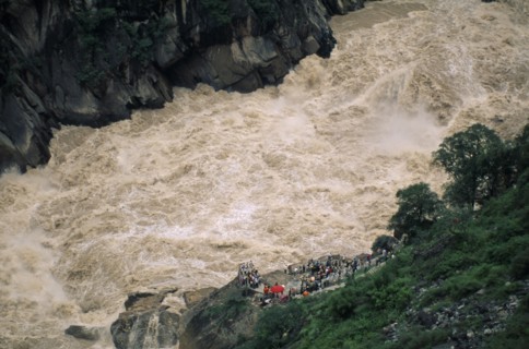 CHINA, Yunnan Province , Yangtze River, Swollen river water at Tiger Leaping Gorge.