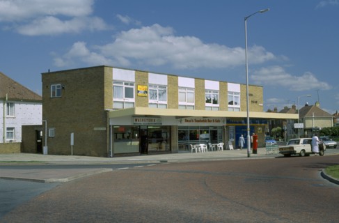 ENGLAND, East Sussex, Eastbourne, Row of local shops in Hampden Park area.