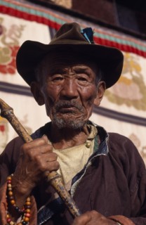 CHINA, Tibet, Lhasa, Portrait of a pilgrim to Jokhang Temple
