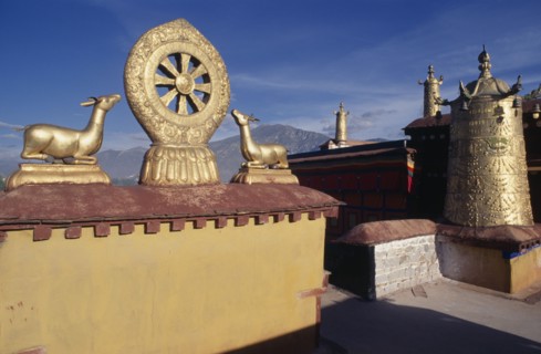 CHINA, Tibet, Lhasa , Jokhang Temple roof with gold statues