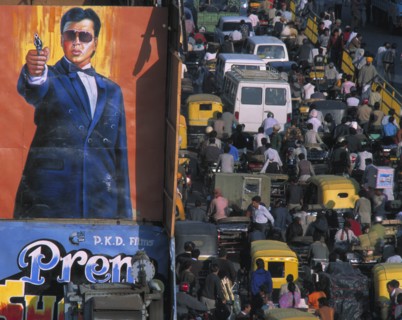INDIA, Uttar Pradesh, Delhi, "Crowded street of Chandni Chowk with trucks, trishaws and people by