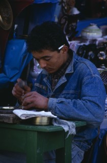 TUNISIA, Kairouan, Engraver at work in the medina