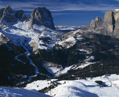 ITALY, Trentino Alto Adige, Dolomites, Val di Fassa. Belvedere. View down mountain side of ski