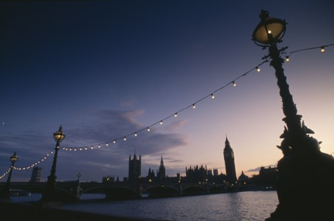 ENGLAND, London, Houses of Parliament seen from across the River Thames at night
