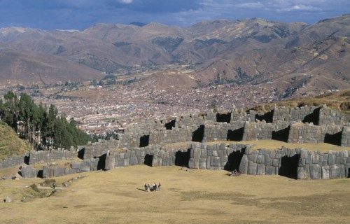PERU, Cusco Department, Sacsayhuamán, Looking down on visitors walking between the Inca walls and
