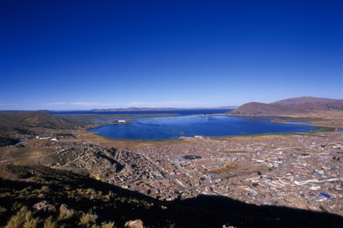 PERU, Puno Administrative Department, Puno, View over Puno twards Lake Titicaca in the distance.