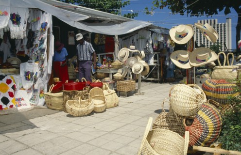 WEST INDIES, Jamaica, Ocho Rios, Tourist goods for sale in market.
